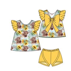 two pieces of clothing with sunflowers on the top and bottom, one is yellow