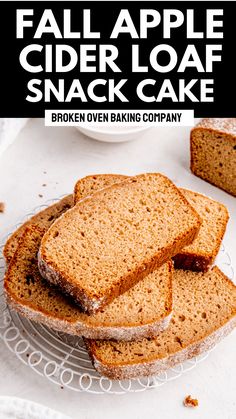 a close up of slices of bread on a plate with the words fall apple cider loaf snack cake