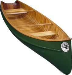 a green canoe with two oars on the side