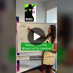 a woman standing in front of a whiteboard with the words widgetd and the wizard of oz timeline written on it