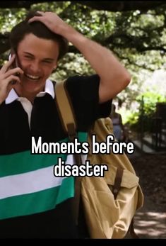 a man talking on a cell phone while wearing a green, white and black shirt