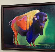 an oil painting of a bison on a wall