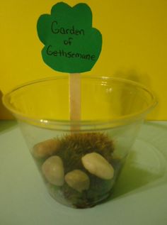 a bowl with rocks in it that says garden of gethsername on the top