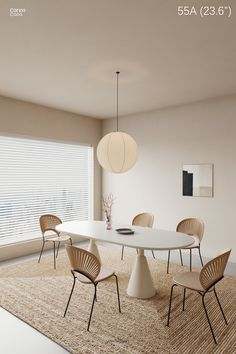 a white table and four chairs in a room