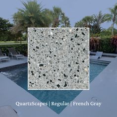 an image of a pool with rocks and gravel in the background that says quartzscapes / regular french gray