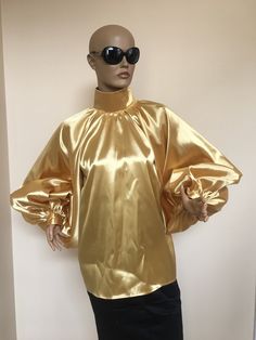 "This is a very stylish Womens Satin blouse. It is comfortable and cozy. Made for a free flowing fit. Great for all year around and for any special occasion or casual day can be dressed up or dressed down. SIZE CHART SIZE S - US 6, UK 8, EU 36 bust: bust around 34.5\"/90cm Waist: waist around 27.5\"/70cm Hips: hips around 34.5\"/90cm SIZE M - US 8, UK 10, EU 38 bust: bust around 37.5\"/95cm Waist: waist around 29.5\"/75cm Hips: hips around 37.5\"/95cm SIZE L - US 10, UK 12, EU 40 bust: bust arou Classic Gold Silk Blouse, Elegant Gold Silk Blouse, Evening Puff Sleeve Stretch Blouse, Stretch Puff Sleeve Evening Blouse, Stretch Puff Sleeve Blouse For Evening, Stretch Evening Blouse With Puff Sleeves, Chic Gold Formal Blouse, Classic Satin Tops For Fall, Satin Tops For Fall Party