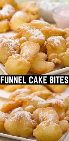 two plates filled with funnel cake bites covered in powdered sugar