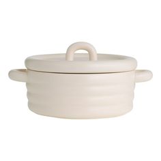 a white casserole dish with handles