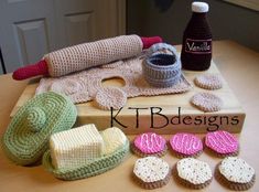 crocheted items are displayed on a table