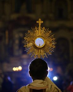 a person with a cross on their head