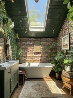 a bathroom with a skylight above the bathtub and rug on the wooden floor