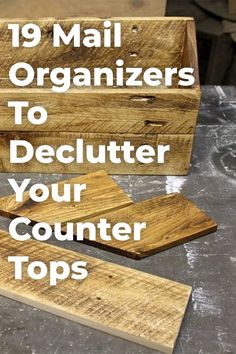 two wooden boxes with the words 19 mail organizers to declutter your counter tops