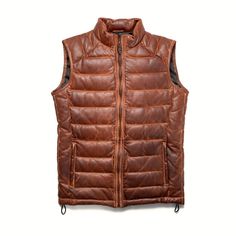 Bridger Leather Vest: Unparalleled Comfort and Style for Any Mountain Adventure Experience the perfect blend of luxury and ruggedness with the Bridger Leather Vest. Designed to keep you feeling as good as it looks, this vest is your ideal companion from the first tracks on the mountain to après-ski relaxation. Crafted from 100% genuine lambskin leather, the vest boasts a velvety texture and a lightweight yet durable feel. The down insulation ensures you stay warm, while the durable 100% polyeste Mens Leather Jacket Vintage, Motorcycle Leather Vest, Plus Size Leather Jacket, Brown Leather Jacket Men, Women Leather Vest, Leather Blazer Women, Distressed Leather Jacket, Leather Coat Womens, Motorcycle Vest