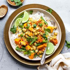 a white plate topped with rice and vegetables