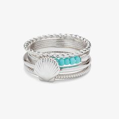 Slay your seaside style with our Shell Ring Stack. This set of four silver designs includes our best-selling Shell Ring, plus a turquoise beaded piece and two textured, stackable styles. Wear them all together for a beautiful beach-day look, or mix and match for something a little more low-key. Promise Rings For Couples, Pura Vida Bracelets, Shell Ring, Twisted Band, Ring Stack, Silver Stacking Rings, Shell Beads, Beaded Rings, Toe Rings