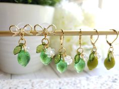 "glass Lime drop earrings with cute white flower and green leaf Material: glass Lime, arcylic leaf and flower, gold plated stud or hook drop length: about 1.25-1.5\" Contains small parts. Use caution when giving to young children less than Age 3 Please keep them away from moisture. If you have any questions, please feel free to contact me. Thanks :)" Joy Outfits, Jewellery Organization, Earrings Food, Lavender Earrings, Beaded Jewelry Earrings, Prom 2023, Fruit Jewelry, Food Earrings, Outfit Shopping