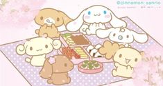 a group of cute little animals sitting around a table with food on top of it