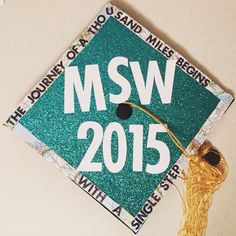 a green and white graduation cap with the words msw 2013 on it's side