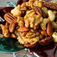 a pile of nuts sitting on top of a plate