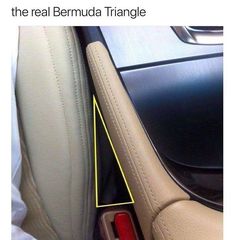 a car seat with an arrow sticking out of it's center console and the text, tweet this is the real bernda triangle