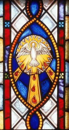 a stained glass window with an angel on it