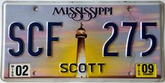 a license plate with a light house on it that says scf 278 scott in the center