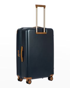 Trolley-spinner luggage case with Tuscan leather trim. Polycarbonate shell. Front zip compartment. Zip around closure for main compartment. 21"W x 11"D x 30"T. Imported. Luggage Case, Spinner Suitcase, Synthetic Materials, Travel Collection, Wall Pockets, Leather Patches, Leather Interior, Amalfi