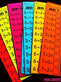 five different colored numbers and one number are on the same page, with an addition to each