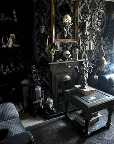 a living room filled with furniture and a fire place in front of a mirror on the wall