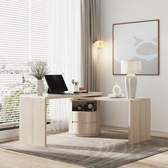 a laptop computer sitting on top of a wooden desk next to a vase and lamp