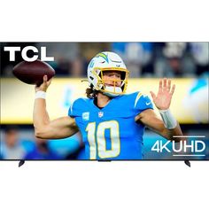 an image of a football player holding a ball in front of the tv screen with the words tcl on it