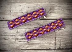 Unique design using fire  colors and  black highlights on a purple background beaded on large alligator hair clips.  Approximately 1/2 inches in width and 2 & 1/4 inches in length.  Sold in pairs only.  Larger size is great for longer or thicker hair. Find us at: www.shelainescreations.store Shelaines Creations @Facebook.com Shelaine2015 @ yahoo.com  Shelaine's Creations on Instagram Shelaine's Creations on Pinte Beaded Alligator, Beaded Barrettes, Black Highlights, Native Beadwork, Thicker Hair, Beaded Earrings Patterns, Alligator Clips, Purple Background, Earring Patterns