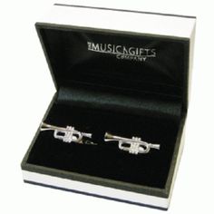 Silver Plated Trumpet Cufflinks. Let That Special Guy In Your Life Blow His Horn With A Little More Confidence As He Plays In These. Makes For A Great Musical Gift! Brand New Handmade In England. Presented In A Beautiful Gift Box. Silver Plated. 1/2" H X 1" W Tags: Music Gift, Music Accessory, Music Themed, Trumpet, Brass, Band, Orchestra, Cufflinks, Links, Suit, Men's Skull Cufflinks, Initial Cufflinks, More Confidence, Musical Gift, Mens Cuff, Silver Bling, Brass Band, Etched Designs, Music Accessories