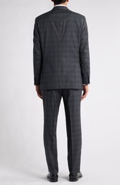 Crisp Italian wool woven in a deep, dusky plaid makes a wardrobe staple of a suit that's crafted with traditional detailing and styled to take you to any formal occasion. Jacket has notched lapels; four-button cuffs; chest pocket; flap pockets; interior pocket; side vents Trousers have zip fly with button-tab closure; slant pockets; back button-welt pockets Lined Unhemmed 99% wool, 1% spandex Dry clean Made in Italy Tailored Plaid Suit With Concealed Placket, Plaid Wool Suit With Notch Lapel, Plaid Wool Suit With Concealed Placket, Plaid Wool Suits With Concealed Placket, Elegant Plaid Sport Coat For Formal Occasions, Classic Plaid Suit With Hidden Button Closure, Classic Plaid Suits With Hidden Button Closure, Timeless Plaid Suit For Work, Timeless Plaid Suits For Work