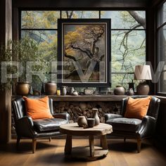 a living room with two leather chairs and a coffee table in front of a large window