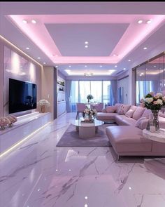 a living room with white marble floors and pink couches in front of a flat screen tv