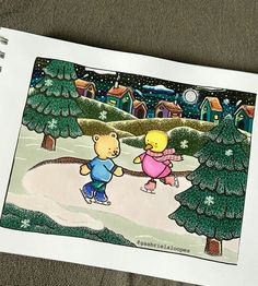 an open book with a drawing of two children skating in the snow next to trees