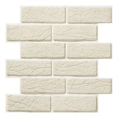 a white brick wall that is made out of cement