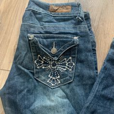 Rhinestone embellished low rise Y2k jeans Free culture size 5 on label Low rise measures 32" at waist edge Front rise is 7 1/2" Inseam  32"  #y2k #lowrise #y2kjeans #truereligion Low Rise Y2k Jeans, Fluorescent Adolescent, Bedazzled Jeans, Low Rise Y2k, Pretty Fits, Cross Jeans, Rhinestone Jeans, Iron Cross, Y2k Jeans