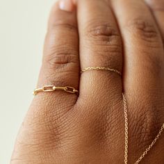 A shiny ring that cuts a cool line, with an uptown girl goes downtown, very New York feeling. Super super excellent in a stack, or on its own. Made with 100% recycled 14k gold. Everyday Gold Chain Ring With Adjustable Chain, Everyday Adjustable Gold Chain Ring, Gold Minimalist Link Ring, Gold Open Band 14k Chain Ring, Gold Open Band Chain Ring, Everyday Yellow Gold Chain Link Ring, Everyday Yellow Gold Adjustable Chain Ring, Everyday Adjustable Yellow Gold Chain Ring, Everyday Yellow Gold Chain Ring