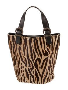 Donald Pliner Top Handle BagBlack LeatherAnimal PrintBrass HardwareCalf Hair TrimFlat HandlesGrosgrain Lining & Dual Interior PocketsSnap Closure at TopIncludes Dust BagUnfortunately, due to restrictions, this item may not be eligible for shipping in all areas. Calf Animal, Handbag Handles, Printed Leather, Leather Handbag, Top Handle, Leather Handbags, Print Patterns, Animal Print, Women Handbags