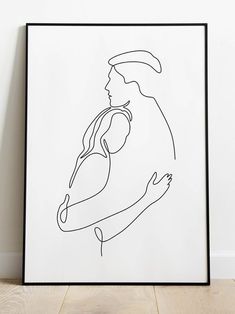 a black and white drawing of a man holding a woman