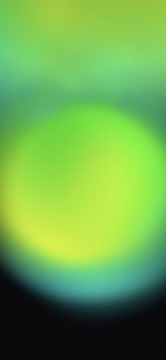 blurry image of green and yellow circles