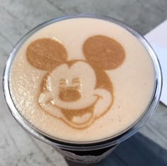 a drink with a mickey mouse drawn on it