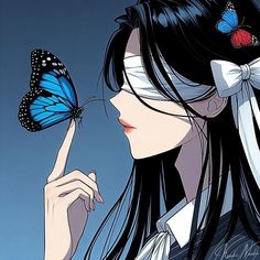 a woman with long hair holding a butterfly in one hand and looking at the other