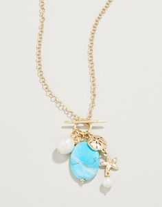 Make a splash with this freshwater pearl and turquoise beaded beauty! This Seaside Necklaces is inspired by a tropical vacation and features a sand dollar and starfish in 18kt matte gold plating. Please note: This design features natural stones and each piece is one-of-a-kind. Colors and patterns may vary slightly from the image shown. Lowcountry Style, Christian Ornaments, Spartina 449, Gold Necklaces, Sand Dollar, Tropical Vacation, Bead Jewellery, Turquoise Beads, Necklace Handmade