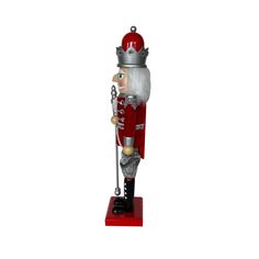 a nutcracker with a crown on it's head is standing in front of a white background