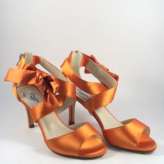 Sweet And Sexy 3'' Heel Satin Strappy Sandals. Adorable Bow On The Outside Ankle. Zipper At The Back For Easy Slip On. Rubber Sole Makes Them Easy Walking And Skid Resistance. Special Bright Color For Fall. Bought For An Event That Didn't Happen Last Year. :( Questions Welcome And Thanks For Looking.