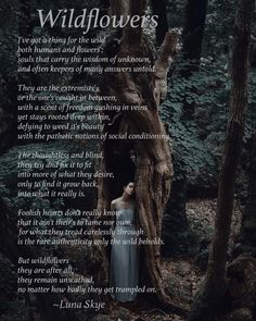 a woman standing in front of a tree with the words wildflowers on it