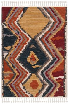 a multicolored area rug with fringes